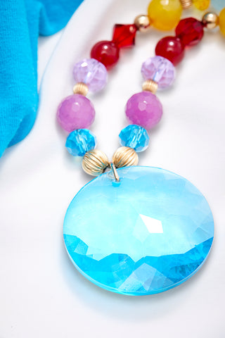 SOFT DREAMY NECKLACE WITH MESMERIZING LOLLIPOP BLUE PENDANT
