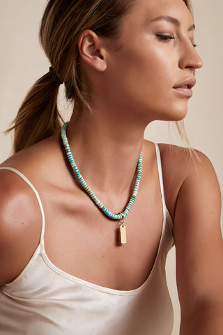 TURQUOISE NECKLACE WITH 14K GOLD RECTANGLE PENDANT